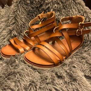 Torrid. Size 9 Wide. Tan sandals with white bottom!